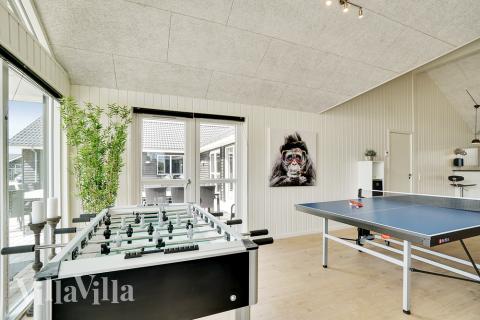 Konkurrer i feriehusets aktivitetsrom når dere besøker luksushus nr. 448 i Østjylland.