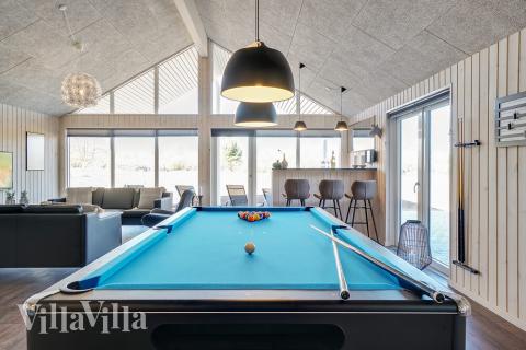 Konkurrer i feriehusets aktivitetsrom når dere besøker luksushus nr. 450 i Østjylland.