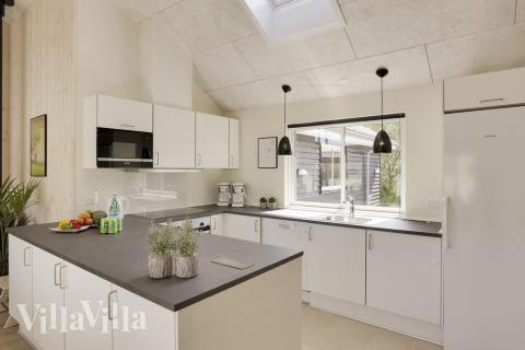 Kjøkkenet i luksushus nr. 433 er fullt utstyrt så dere lett kan lage mat til 16 personer.