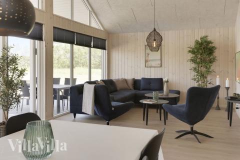 Det er plass til 16 personer i det store lyse oppholdsrommet i luksushus nr. 433.