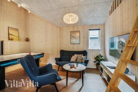 Konkurrer i feriehusets aktivitetsrom når dere besøker luksushus nr. 434 i Nordsjælland.