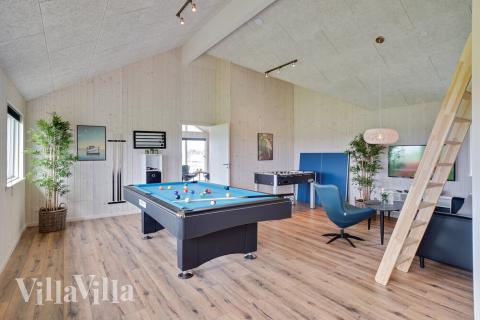 I tillegg til alle aktivitetsmulighetene i husets bassengavdeling, kan du også spille biljard, bordtennis og dart i luksushus nr. 437
