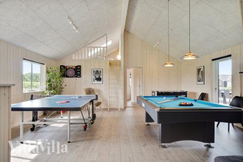 I tillegg til alle aktivitetsmulighetene i husets bassengavdeling, kan du også spille biljard, bordtennis og dart i luksushus nr. 453