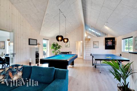 I tillegg til alle aktivitetsmulighetene i husets bassengavdeling, kan du også spille biljard, bordtennis og dart i luksushus nr. 455