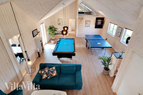 Konkurrer i feriehusets aktivitetsrom når dere besøker luksushus nr. 455 i Vestjylland.