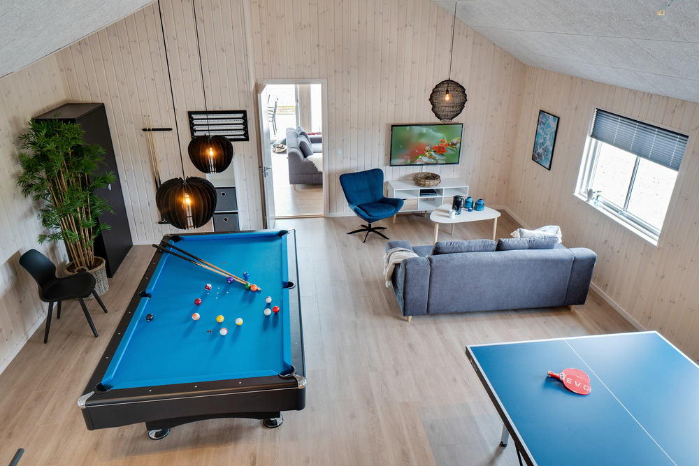 I tillegg til alle aktivitetsmulighetene i husets bassengavdeling, kan du også spille biljard, bordtennis og dart i luksushus nr. 456