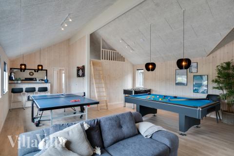 Konkurrer i feriehusets aktivitetsrom når dere besøker luksushus nr. 456 i Vestjylland.