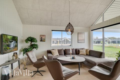 Oppholdsrom med plass til 18 i luksushus nr. 458.