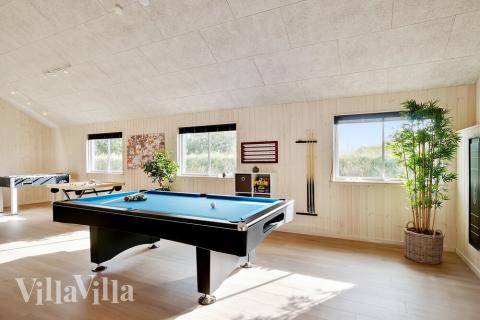 Konkurrer i feriehusets aktivitetsrom når dere besøker luksushus nr. 473 i Vestjylland.