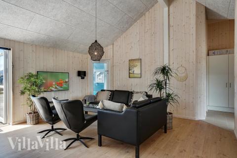 Oppholdsrom med plass til 24 i luksushus nr. 461.