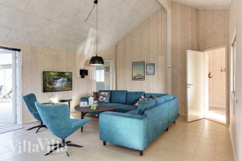 Oppholdsrom med plass til 24 i luksushus nr. 447.