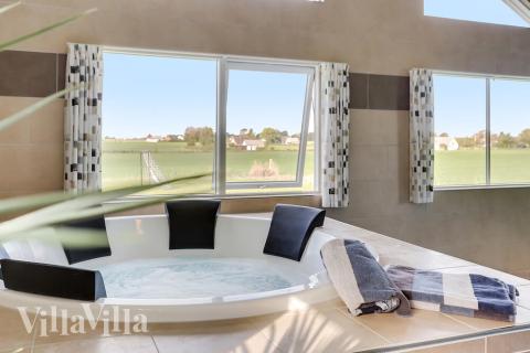 Nyt varmen i boblebadet i luksushus nr. 447 i Lolland/Falster/Møn