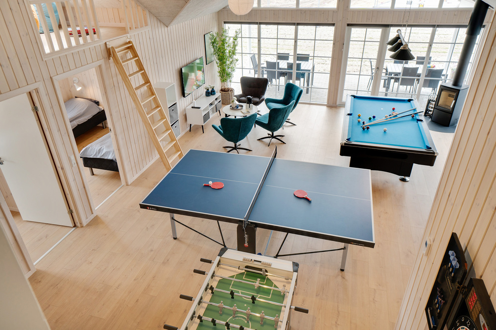I tillegg til alle aktivitetsmulighetene i husets bassengavdeling, kan du også spille biljard, bordtennis og dart i luksushus nr. 465