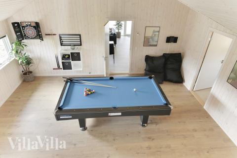 I tillegg til alle aktivitetsmulighetene i husets bassengavdeling, kan du også spille biljard, bordtennis og dart i luksushus nr. 452