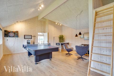 Konkurrer i feriehusets aktivitetsrom når dere besøker luksushus nr. 472 i Østjylland.