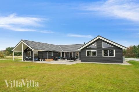 Dette lekre huset med svømmebasseng, nr. 474, med plass til 20 personer, ligger i Østjylland