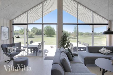 Oppholdsrom med plass til 16 i luksushus nr. 459.