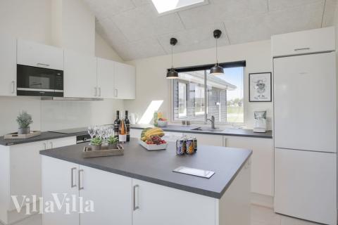 Kjøkkenet i luksushus nr. 459 er fullt utstyrt så dere lett kan lage mat til 16 personer.