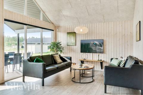 Oppholdsrom med plass til 16 i luksushus nr. 464.