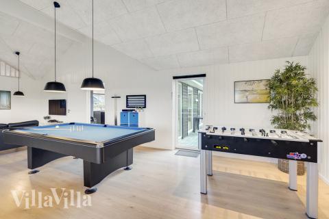 Konkurrer i feriehusets aktivitetsrom når dere besøker luksushus nr. 468 i Lolland/Falster/Møn.