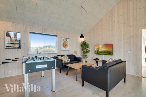 Konkurrer i feriehusets aktivitetsrom når dere besøker luksushus nr. 477 i Vestjylland.