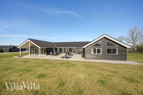 Dette lekre huset med svømmebasseng, nr. 479, med plass til 26 personer, ligger i Østjylland