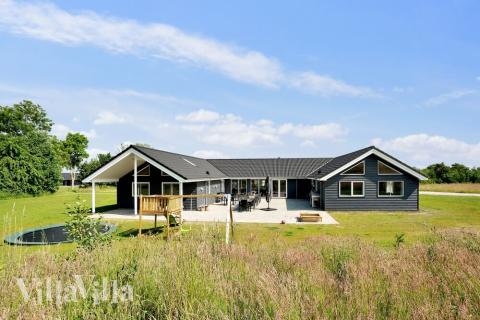 Dette lekre huset med svømmebasseng, nr. 480, med plass til 24 personer, ligger i Østjylland