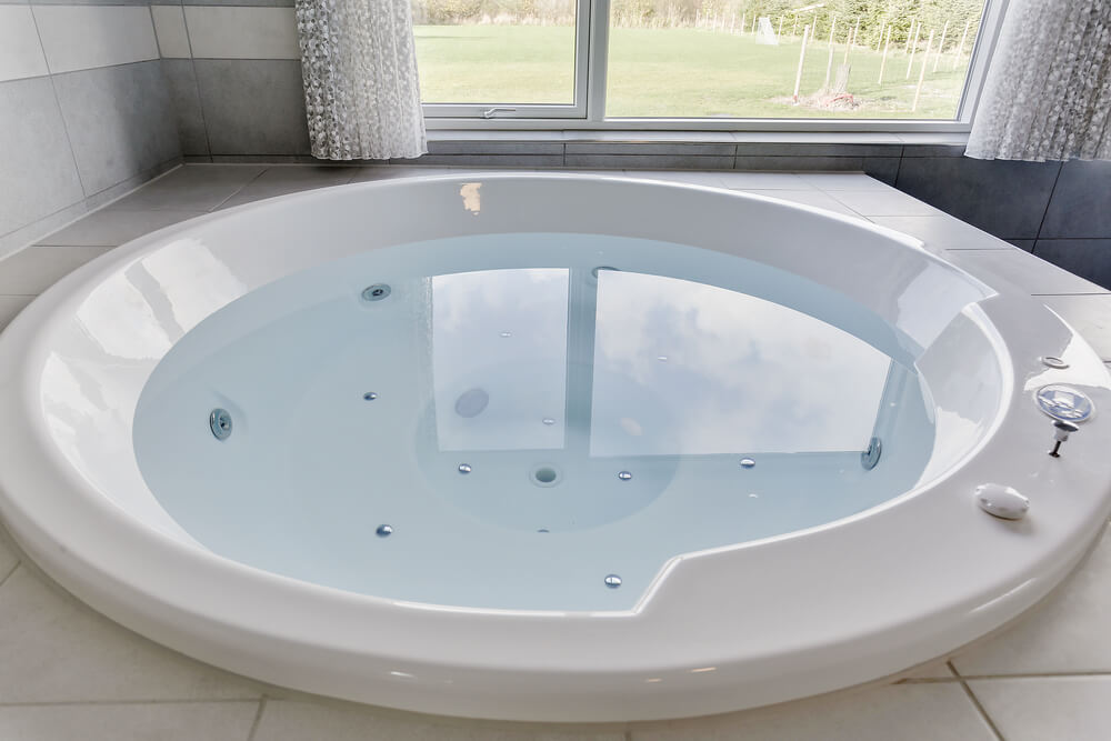 Nyt varmen i boblebadet i luksushus nr. 481 i Lolland/Falster/Møn