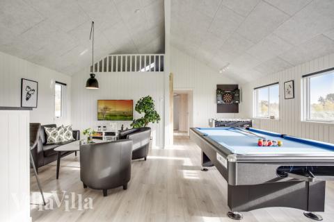 I tillegg til alle aktivitetsmulighetene i husets bassengavdeling, kan du også spille biljard, bordtennis og dart i luksushus nr. 489