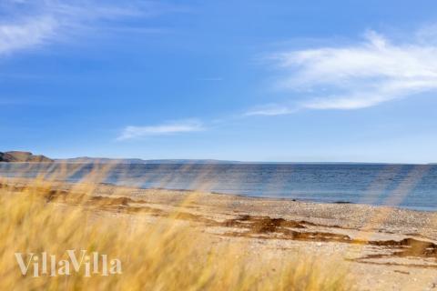 Stranden nær luksushus nr. 489.
