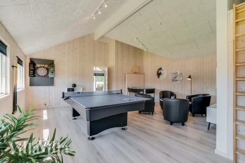 I tillegg til alle aktivitetsmulighetene i husets bassengavdeling, kan du også spille biljard, bordtennis og dart i luksushus nr. 475