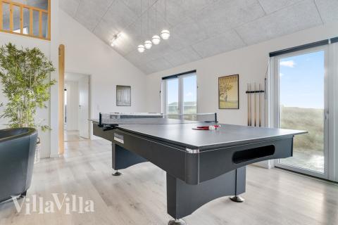 Konkurrer i feriehusets aktivitetsrom når dere besøker luksushus nr. 486 i Vestjylland.