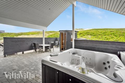 Stort utvalg av utendørsaktiviteter ved luksushus nr. 486 i Vestjylland.