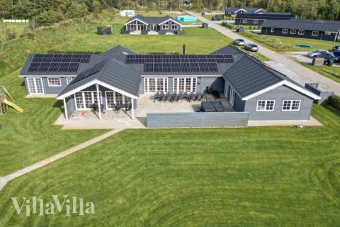 Dette lekre huset med svømmebasseng, nr. 500, med plass til 26 personer, ligger i Nordjylland