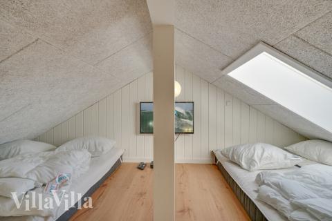 Noen av de 14 soveplassene i luksushus nr. 504 finnes på hems