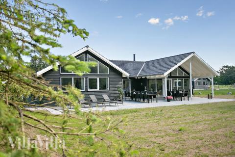 Dette lekre huset med svømmebasseng, nr. 726, med plass til 18 personer, ligger i Tyskland