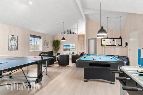 Konkurrer i feriehusets aktivitetsrom når dere besøker luksushus nr. 730 i Tyskland.