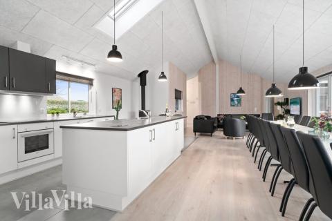 Oppholdsrom med plass til 24 i luksushus nr. 730.