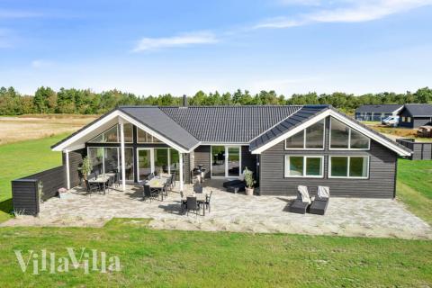 Dette lekre huset med svømmebasseng, nr. 732, med plass til 20 personer, ligger i Tyskland