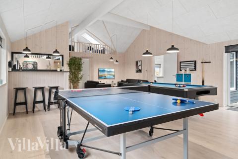 I tillegg til alle aktivitetsmulighetene i husets bassengavdeling, kan du også spille biljard, bordtennis og dart i luksushus nr. 732