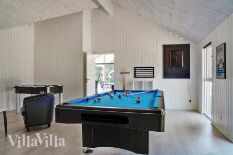 I tillegg til alle aktivitetsmulighetene i husets bassengavdeling, kan du også spille biljard, bordtennis og dart i luksushus nr. 503