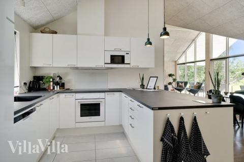 Kjøkkenet i luksushus nr. 519 er fullt utstyrt så dere lett kan lage mat til 14 personer.