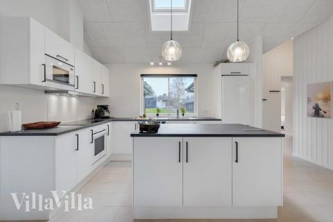 Kjøkkenet i luksushus nr. 513 er fullt utstyrt så dere lett kan lage mat til 16 personer.