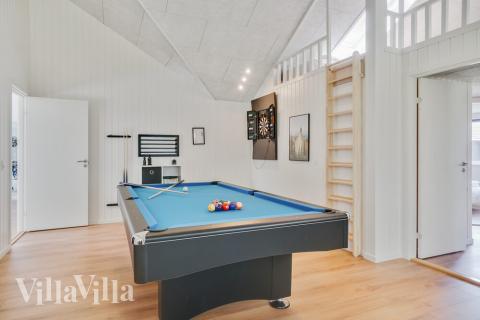I tillegg til alle aktivitetsmulighetene i husets bassengavdeling, kan du også spille biljard, bordtennis og dart i luksushus nr. 515