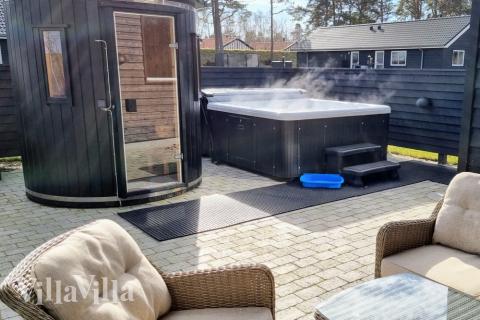 Nyt varmen i boblebadet i luksushus nr. 515 i Lolland/Falster/Møn