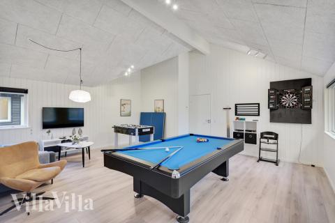 Konkurrer i feriehusets aktivitetsrom når dere besøker luksushus nr. 517 i Lolland/Falster/Møn.