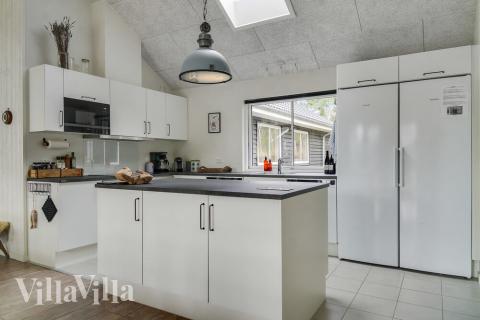 Kjøkkenet i luksushus nr. 506 er fullt utstyrt så dere lett kan lage mat til 18 personer.