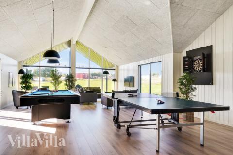 I tillegg til alle aktivitetsmulighetene i husets bassengavdeling, kan du også spille biljard, bordtennis og dart i luksushus nr. 497