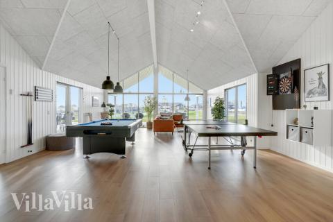 I tillegg til alle aktivitetsmulighetene i husets bassengavdeling, kan du også spille biljard, bordtennis og dart i luksushus nr. 496