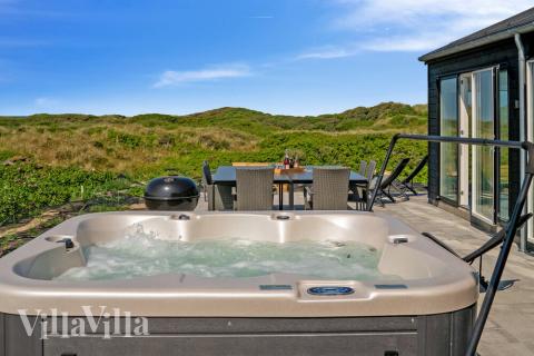 Dette lekre huset med spa, nr. 514, med plass til 10 personer, ligger i Nordjylland